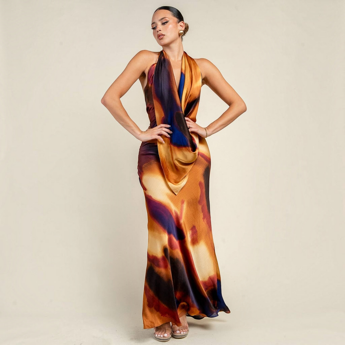 Angie Style Boutique halter cowl neck maxi dress in a vibrant abstract orange and purple print with an open back
