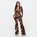Angie Style Boutique slim fit long sleeve jumpsuit in brown and white abstract print with V-neck and shoulder pads