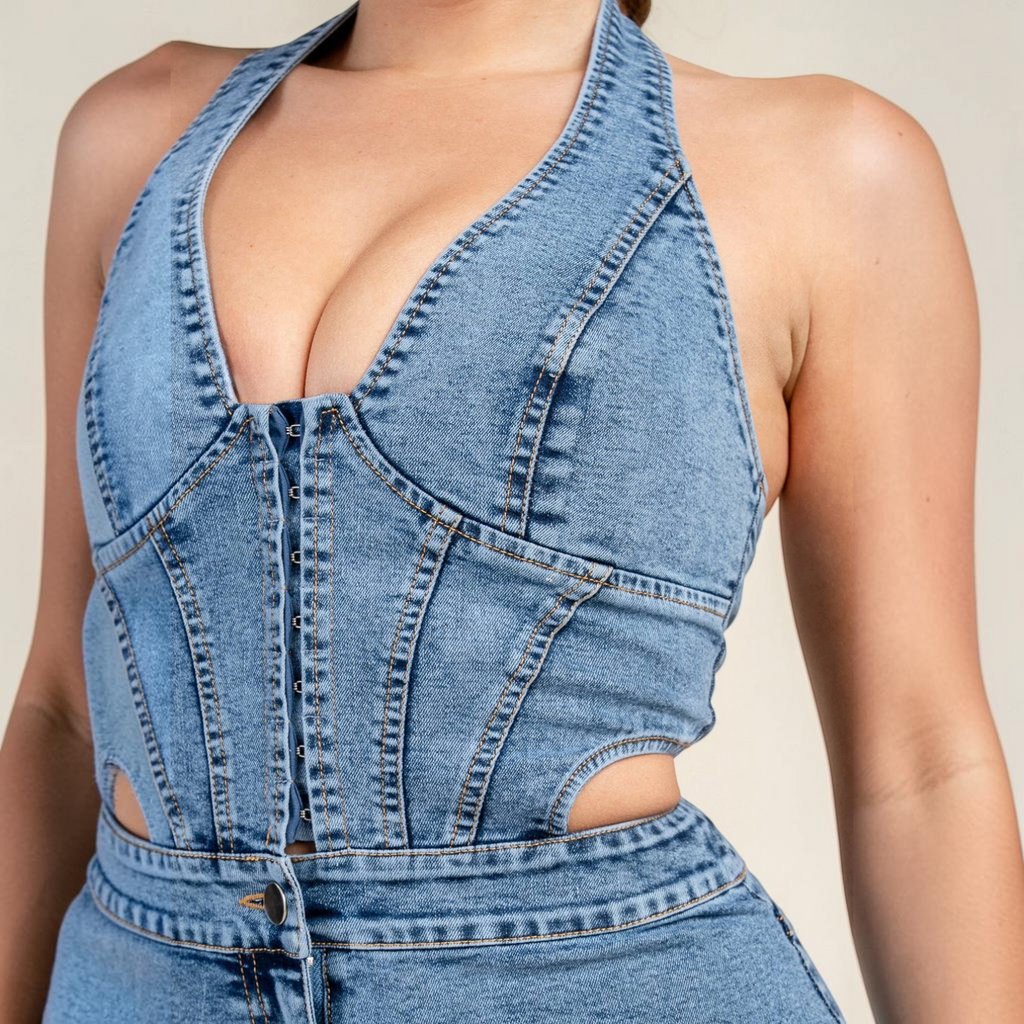 Angie Style Boutique halter neck denim mini dress featuring a corset-style bodice with front hook-and-eye closures.