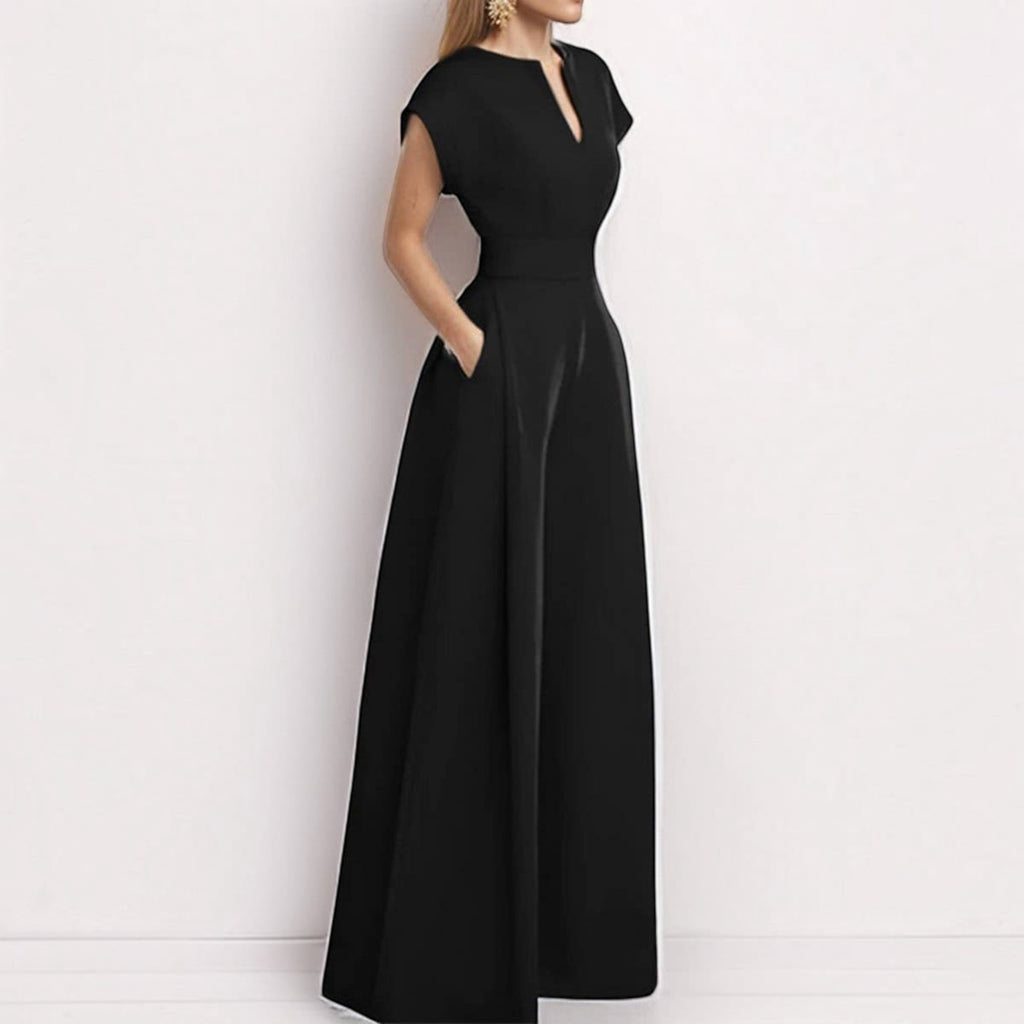 Angie Style Boutique black high-waist wide-leg jumpsuit with a V-neckline and side pockets on a model