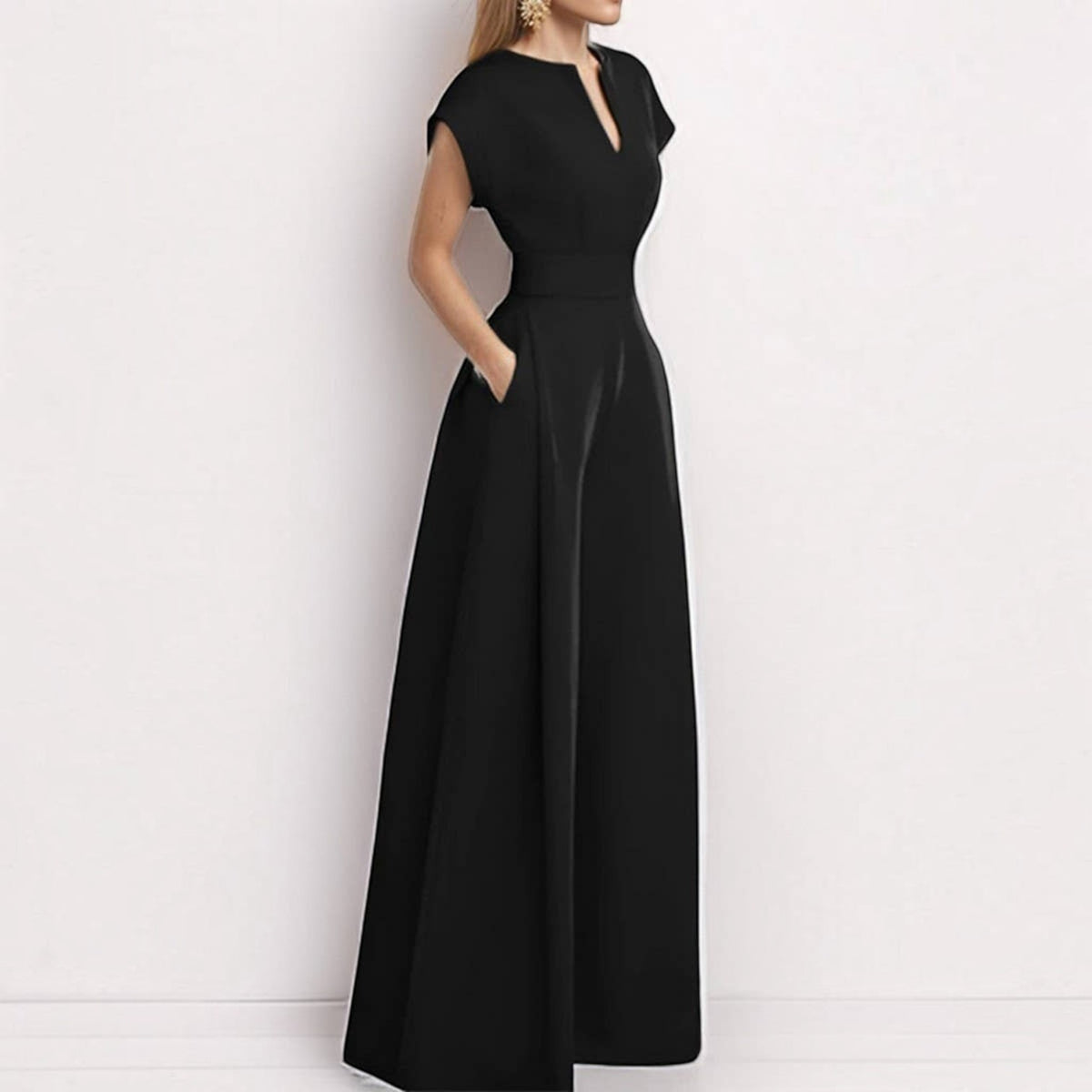 Angie Style Boutique black high-waist wide-leg jumpsuit with a V-neckline and side pockets on a model