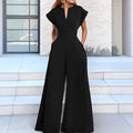 Angie Style Boutique black high-waist wide-leg jumpsuit with a V-neckline and short sleeves on a model
