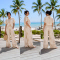 Angie Style Boutique cream and gold floral embroidered two-piece resort set with wide-leg pants on a tropical beach.