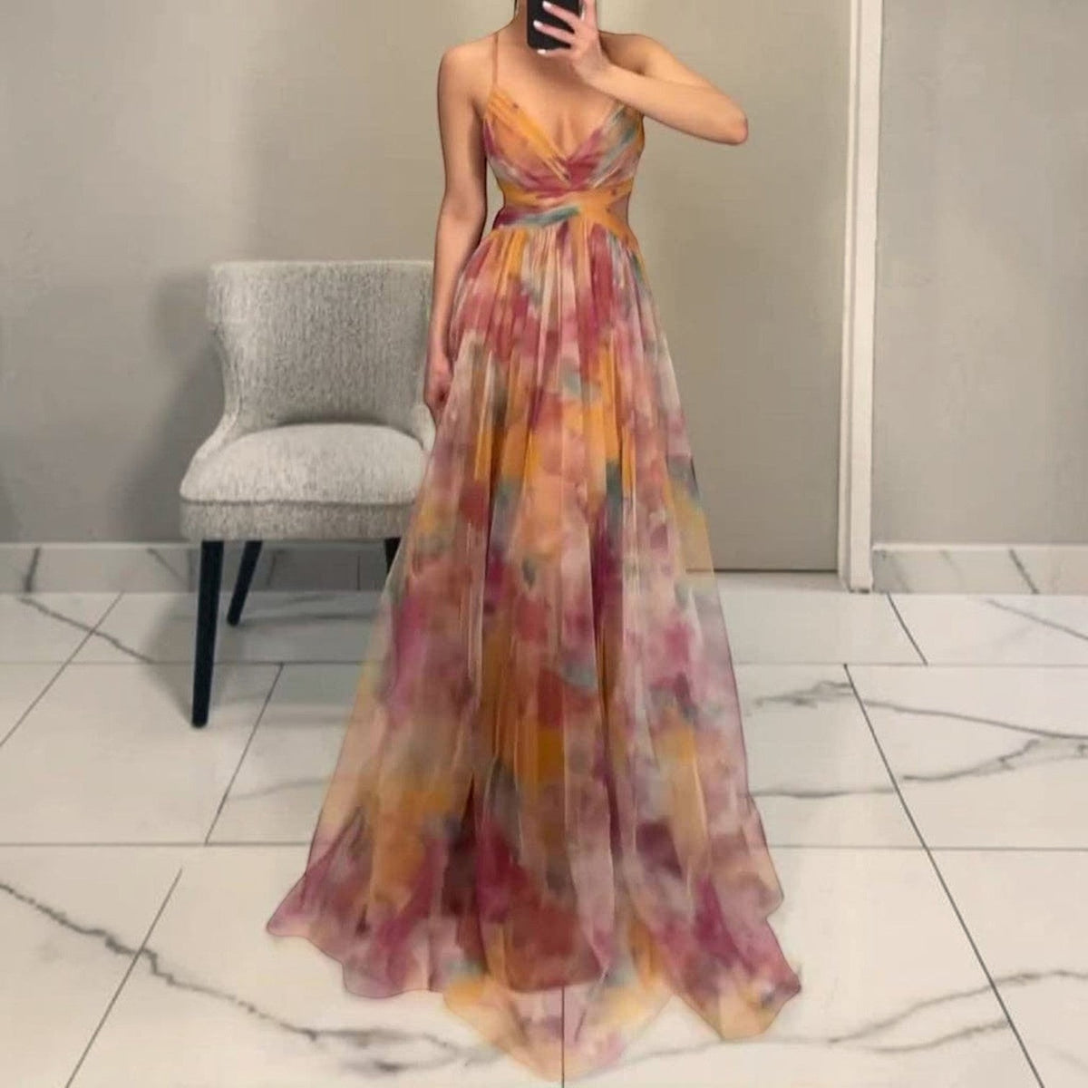 Angie Style Boutique elegant floral evening gown with draped bodice, delicate straps, and flowing polyester skirt.