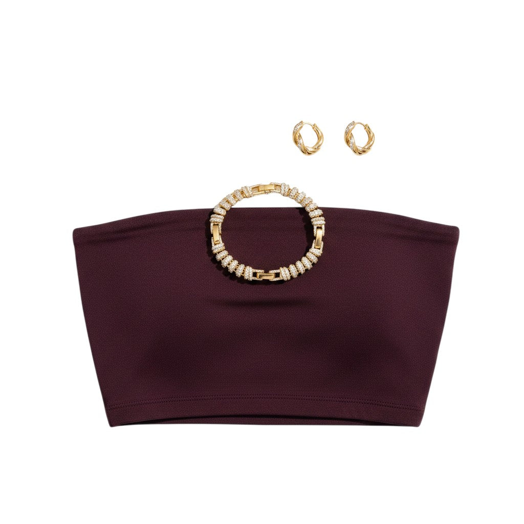 Angie Style Boutique gold chunky chain link bracelet with crystal accents and matching hoop earrings on dark top