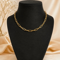 Angie Style Boutique gold paperclip chain necklace with polished elongated oval links on a black display bust