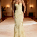 Angie Style Boutique pale yellow evening gown with floral embroidery, spaghetti straps, and a fitted silhouette.